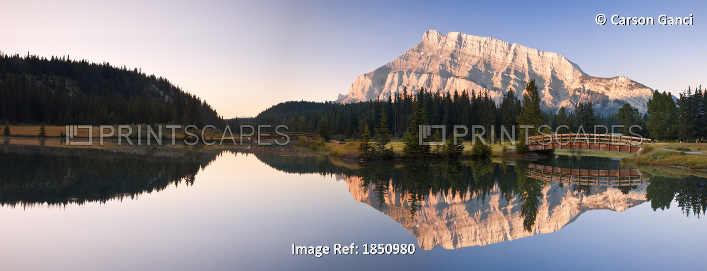 A Scenic Shot Of A Mountainside And Small Bridge; Banff National ...