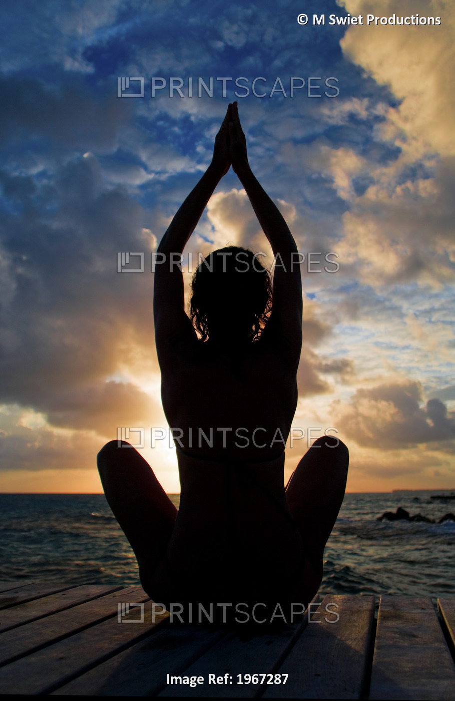 Silhouette Of Woman Doing Yoga On Oceanside Pier.