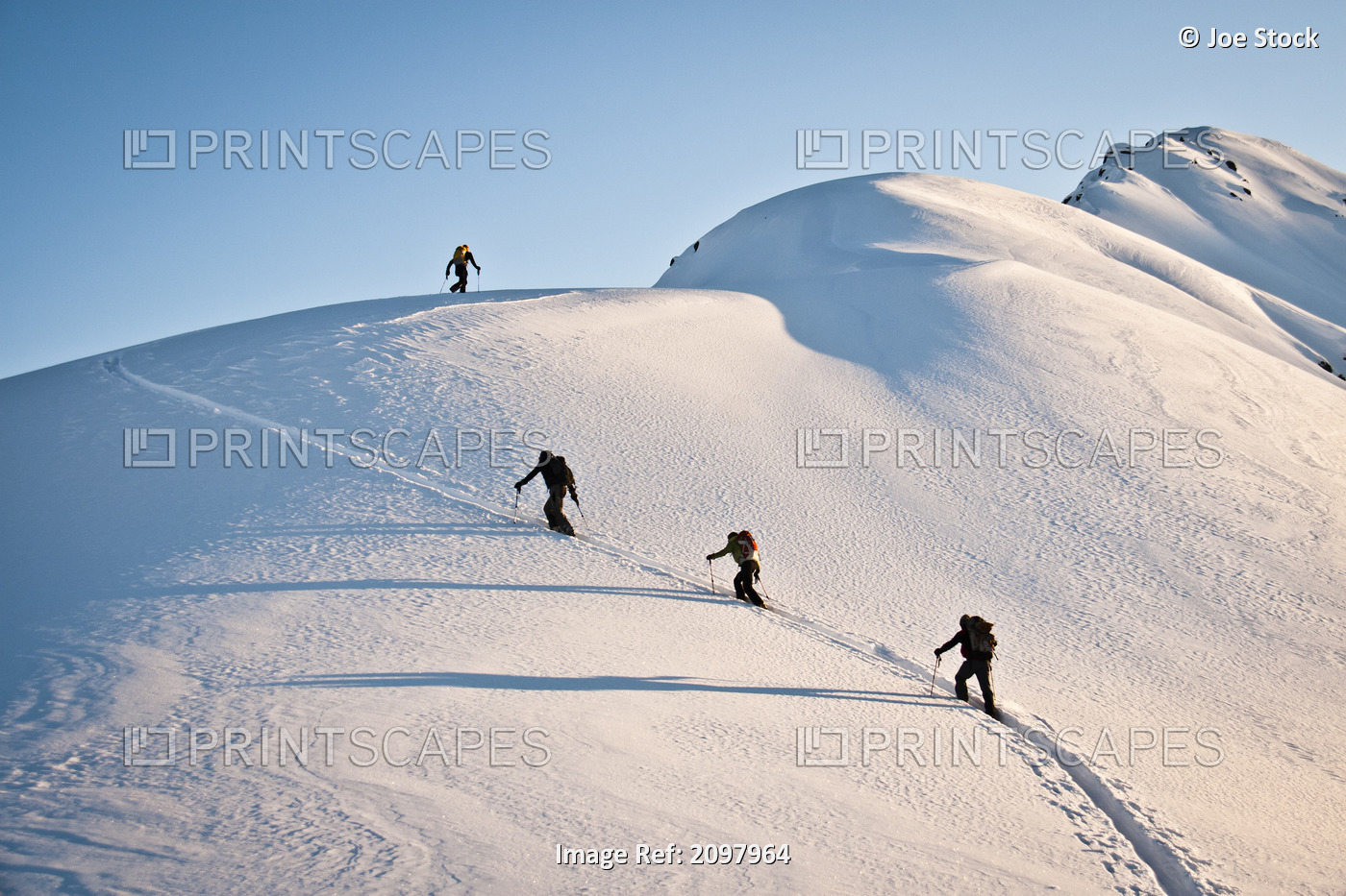 Group Of Backcountry Skiiers Skinning Up A Rail On Cornbiscuit, Turnagain Pass, ...