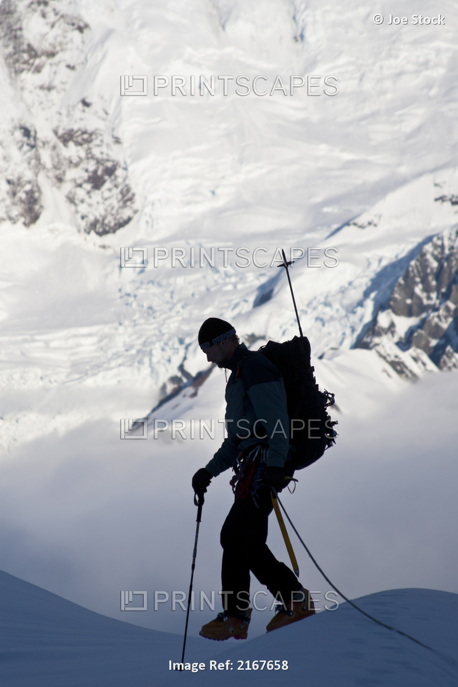Climber Silhouetted On The Summit Of Control Tower With Glacier Icefall And ...