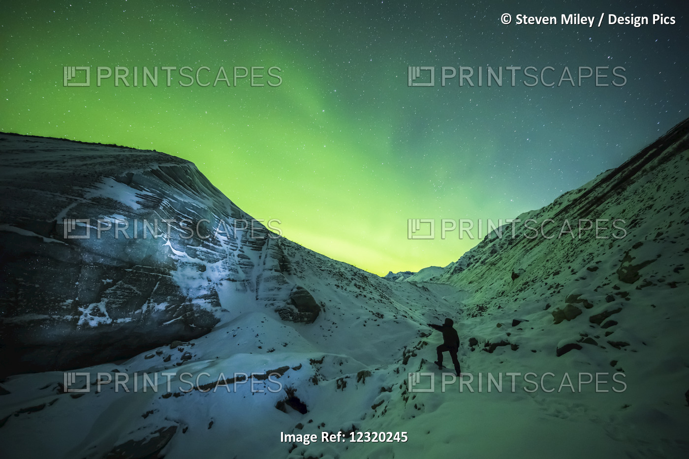 A Man Lights Up The Ice Of Castner Glacier With A Flashlight Underneath A ...