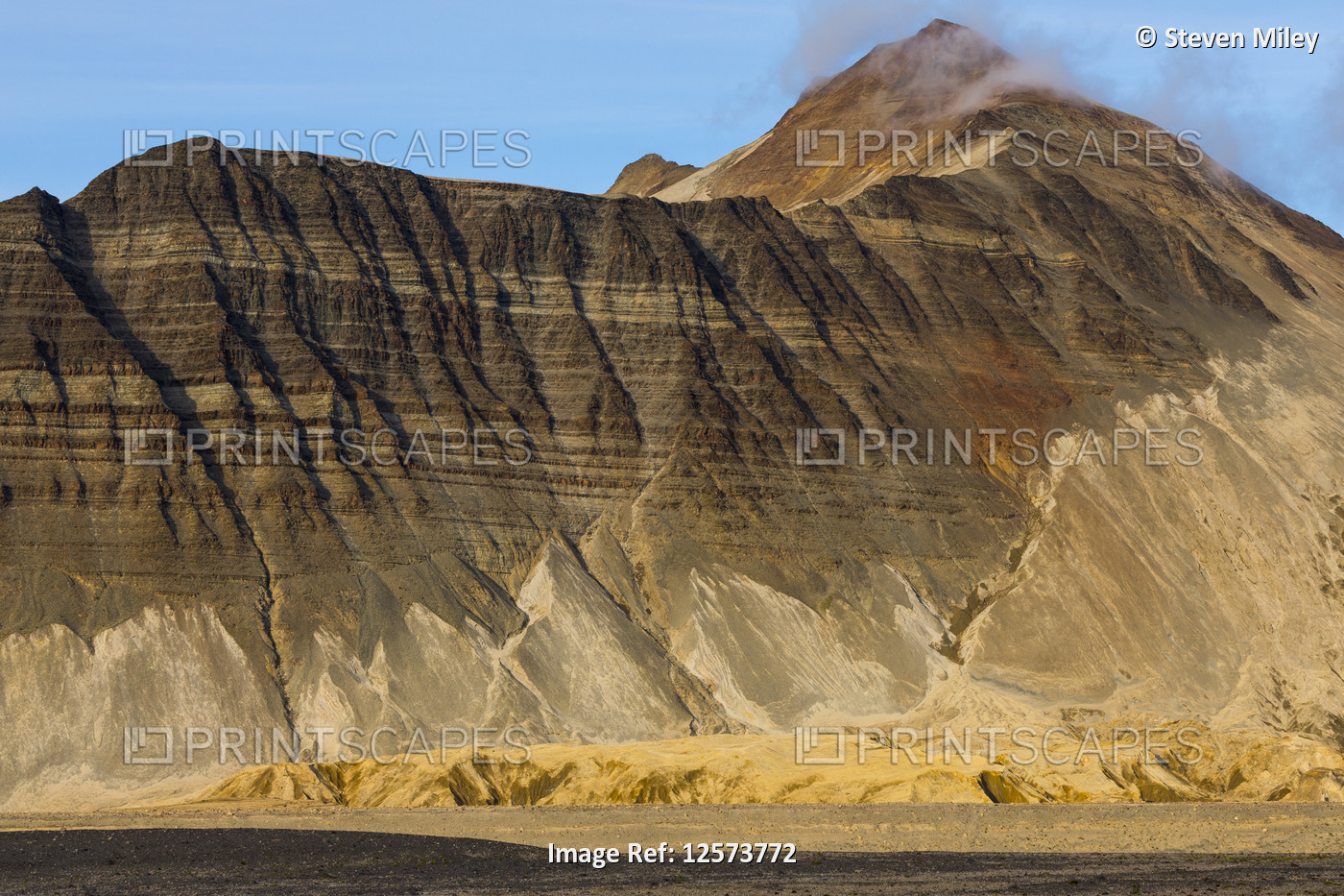 Wedge Mountain rises above one of the Knife Creek Glaciers (covered in ash at ...