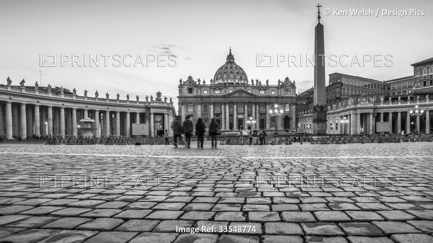 Rome, Italy.  St Peter's Basilica seen across St Peter's Square.  The historic ...