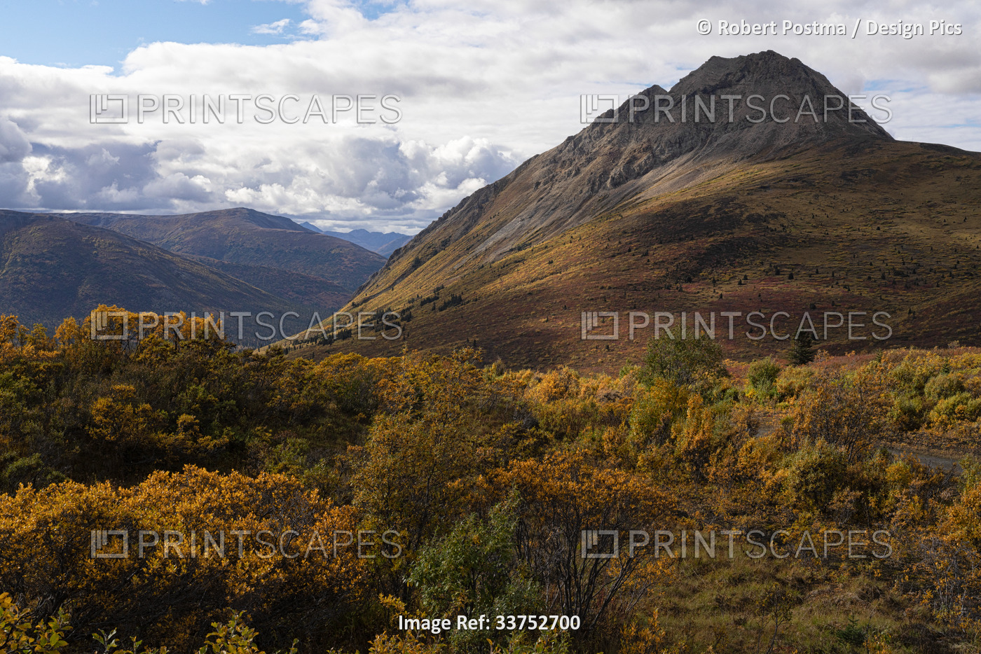 Beautiful autumn colours over the mountains along the South Canol Road on a ...