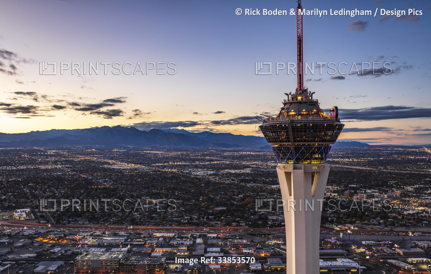 Aerial evening view of the landmark hotel and casino tower in Las Vegas, ...