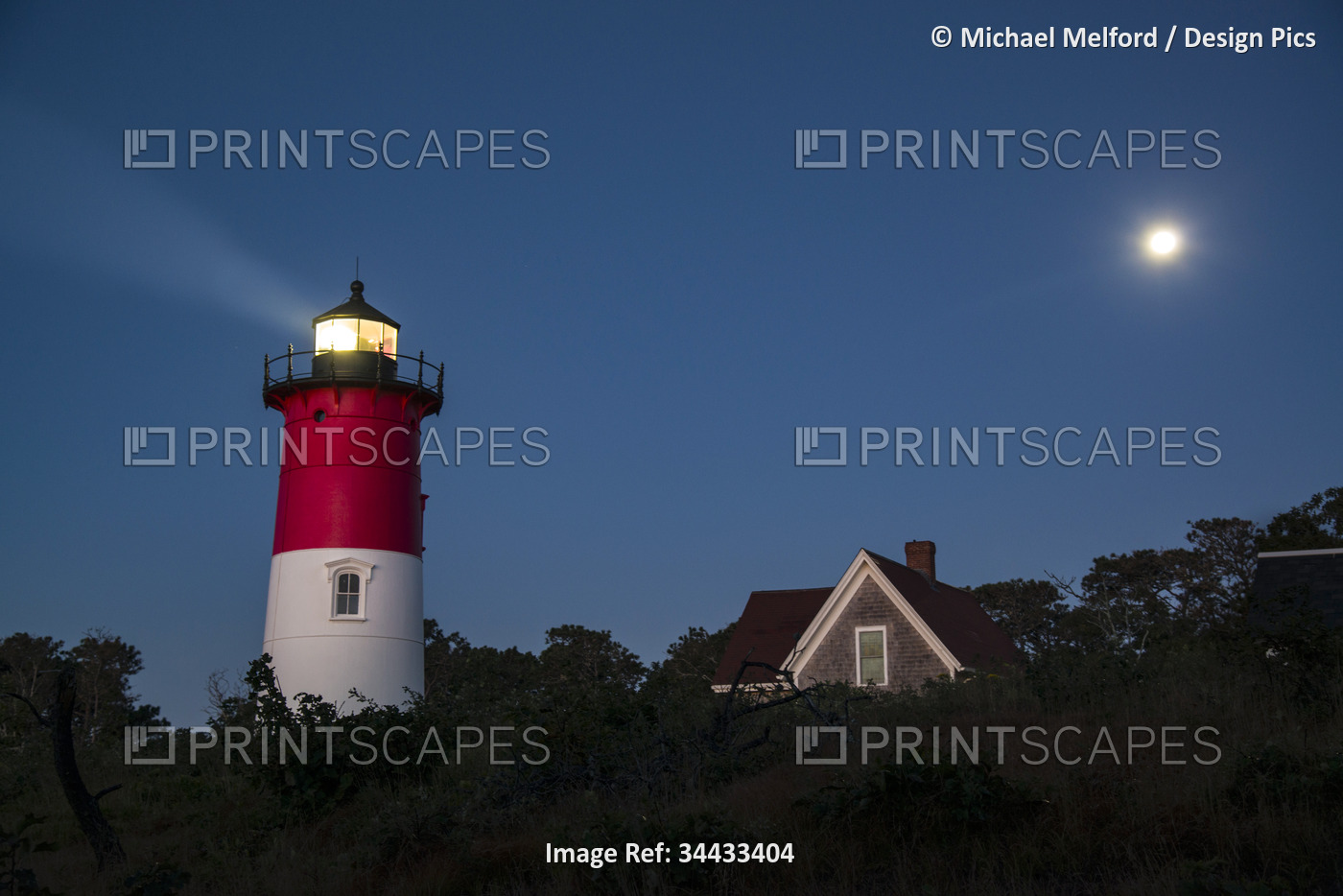 Nauset Light illuminated at night; Eastham, Cape Cod, Massachusetts, United ...