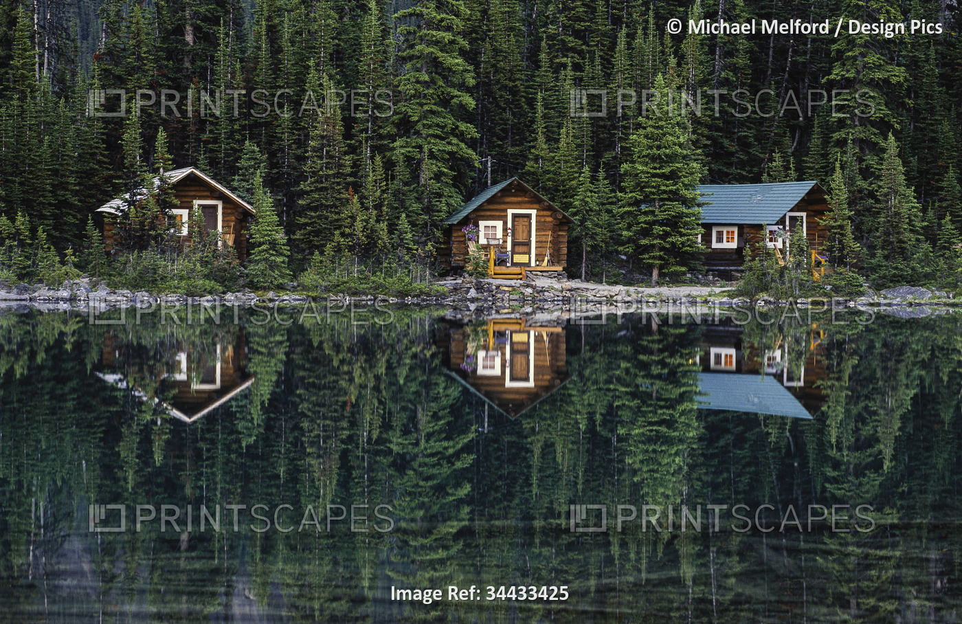 Log cabins on the edge of Lake O'Hara in Yoho National Park, BC, Canada; ...