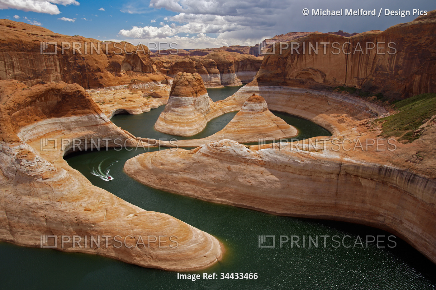 Boat traces the curves of Reflection Canyon, part of Glen Canyon National ...