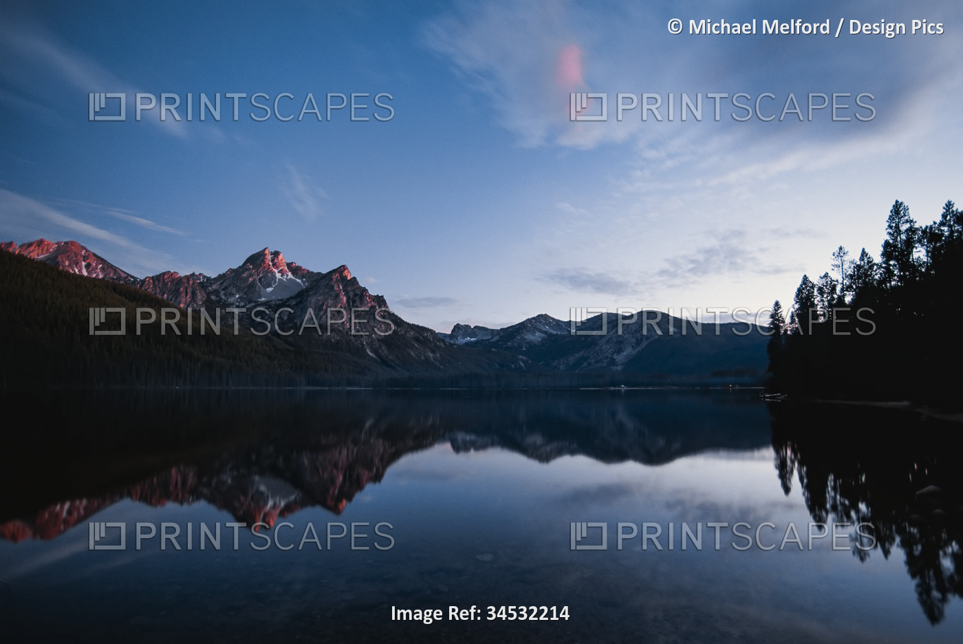 Twilight view of the Sawtooth Range reflected on Sawtooth Lake; Idaho, United ...
